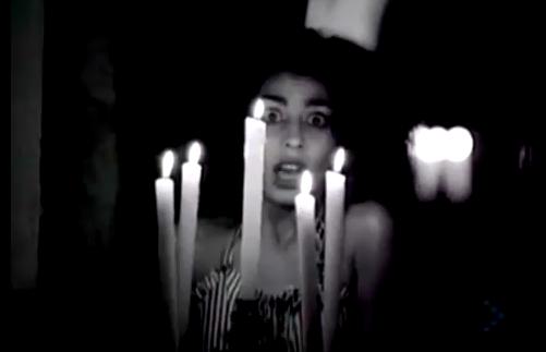 A still from the video for "Dracula's Tango" by Toto Coelo