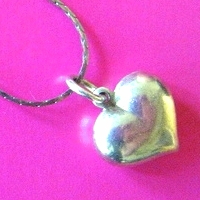 an '80s silver heart necklace