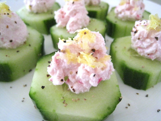 Beet-infused goat cheese on cucumber slices
