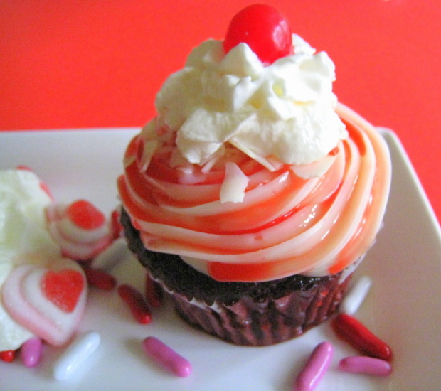 Strawberry sauce adds color to buttercream frosting