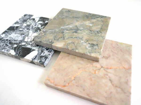 Marble tiles in black, grey and peach