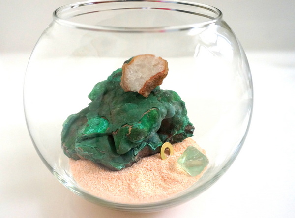 Mineral scape in a spherical glass bowl