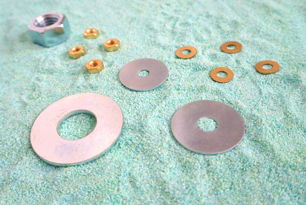 Washers and hex nuts in silver and gold tones