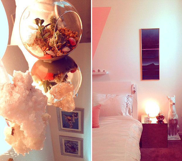 Crystals and a terrarium grace the mirrored nightstand