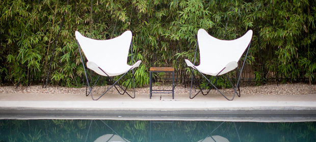 Poolside seating at Austin's San Jose Hotel